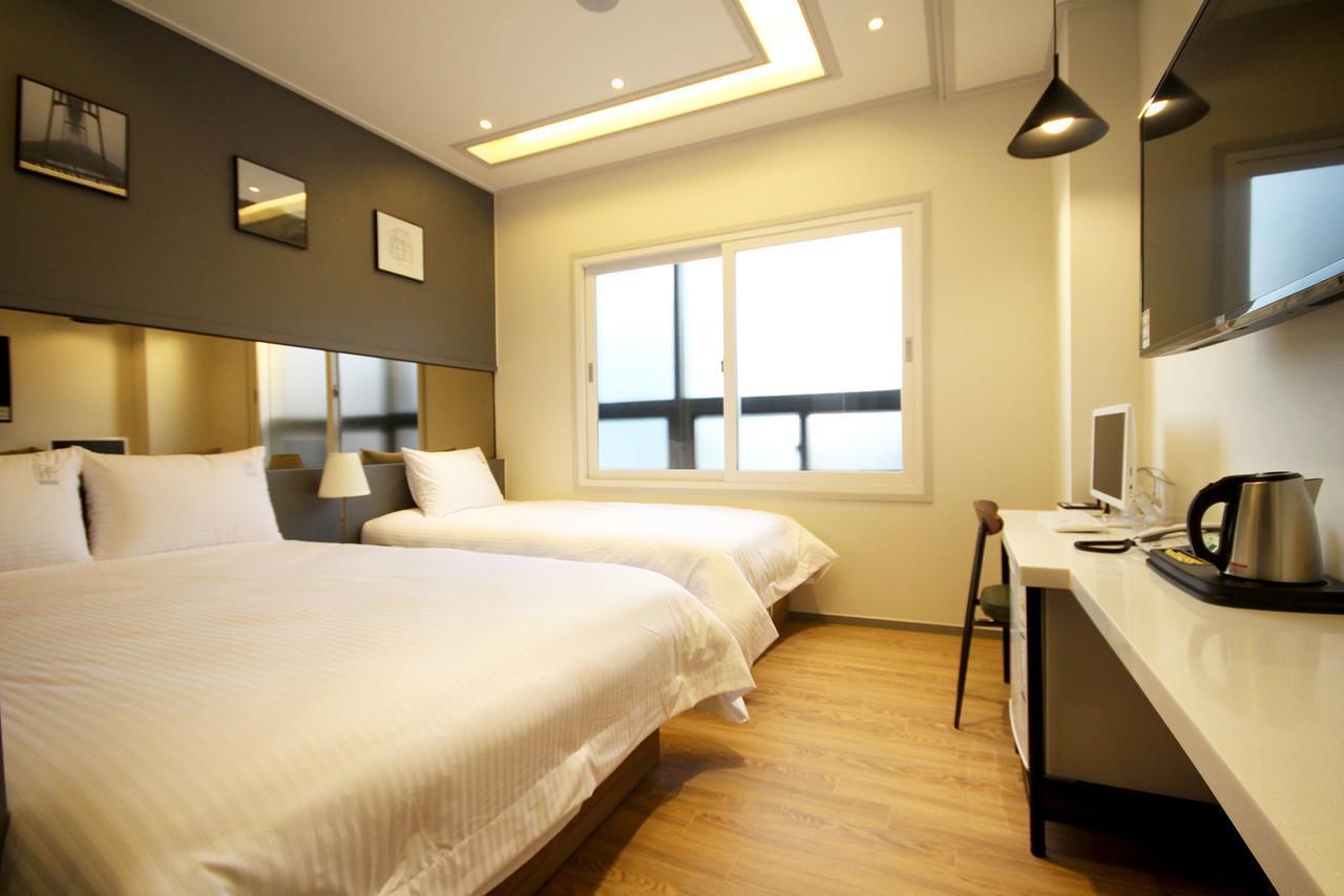 If Business Hotel تَنوان المظهر الخارجي الصورة